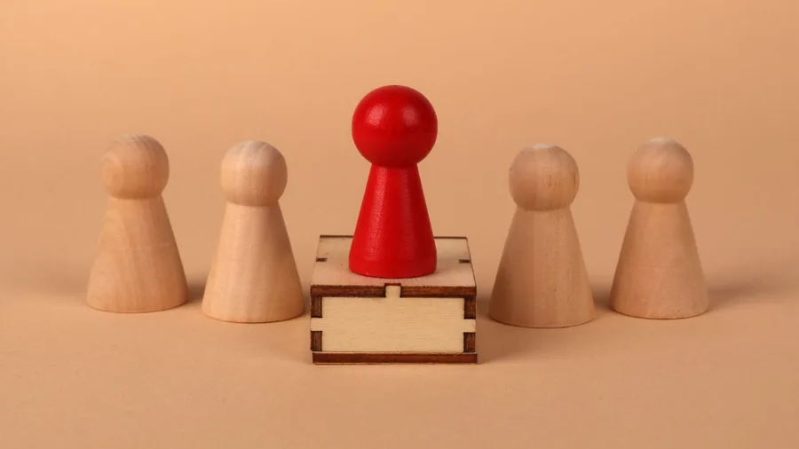 The High Performer's Isolation Is Engineered, Not Natural